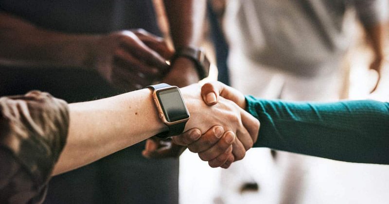 People Board of Directors Shaking Hands